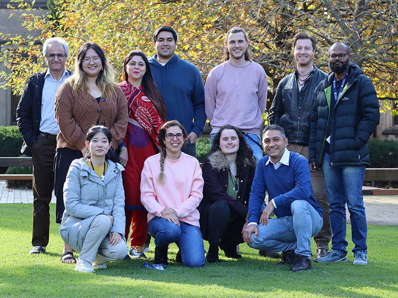 Group of people from Crop Evolution and Molecular Genetics posing on lawn